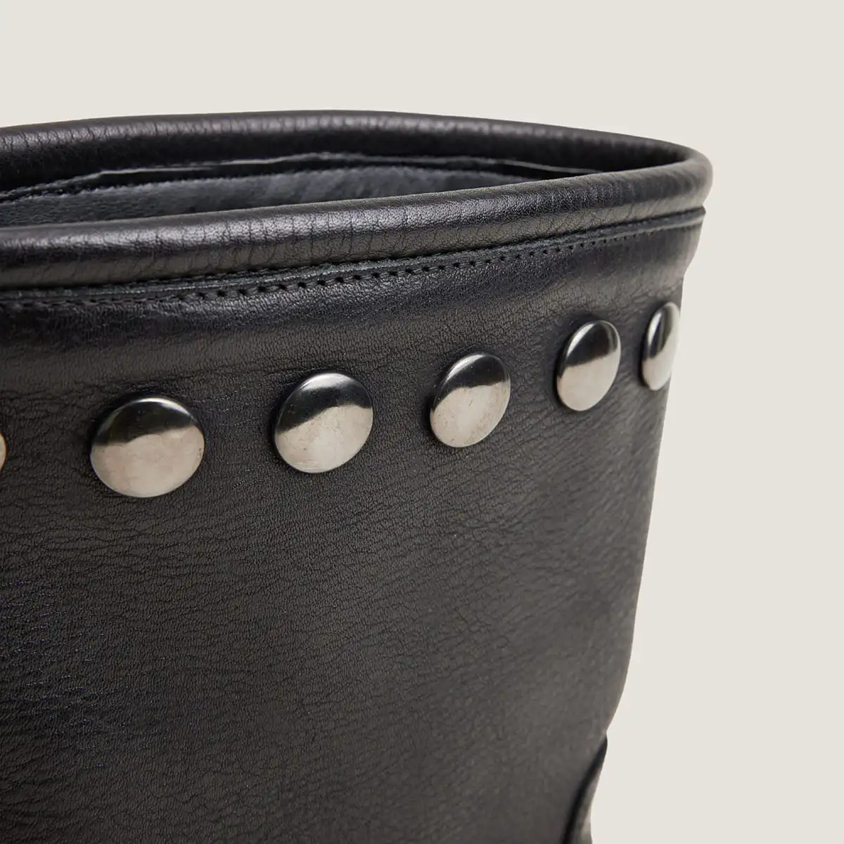 Rivets boots with lug soles in black grained leather | REGAN