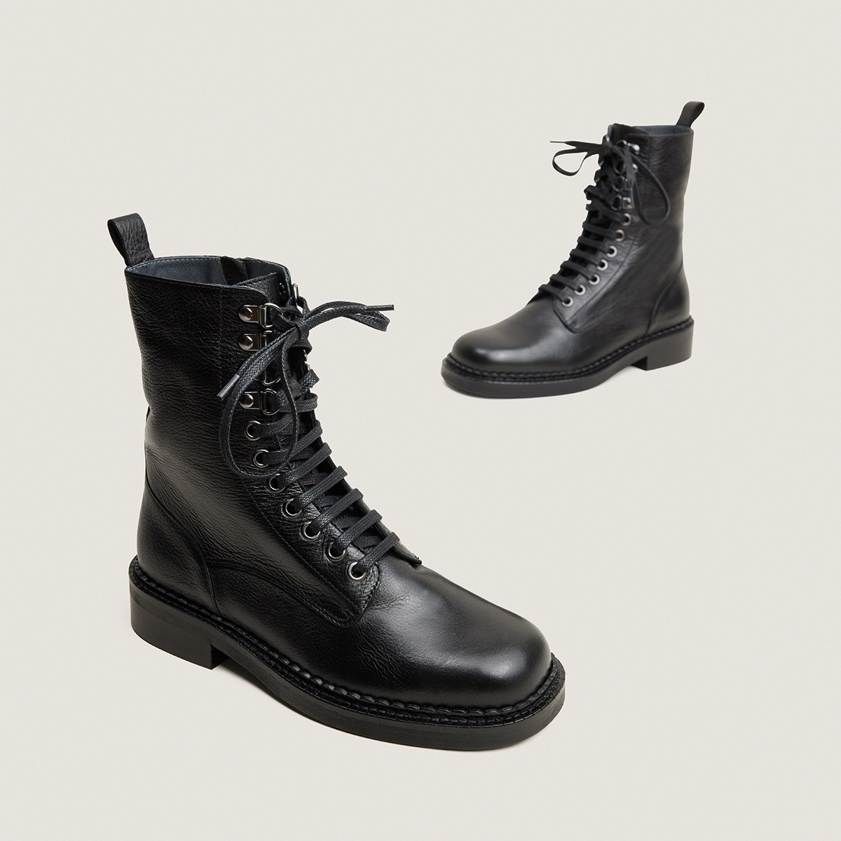 Lace-up heeled ankle boots in black grained leather | DOLL