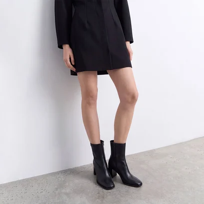 Heeled monogram ankle boots in black leather | vaubas