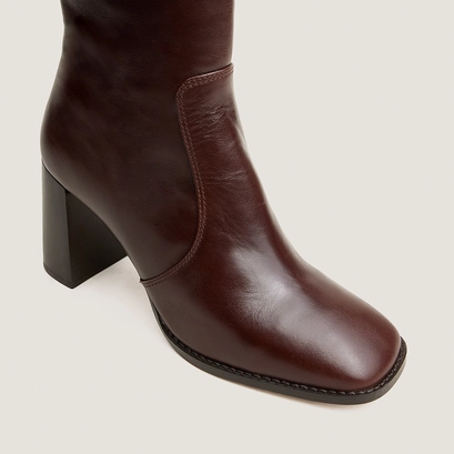 Heeled monogram boots brown