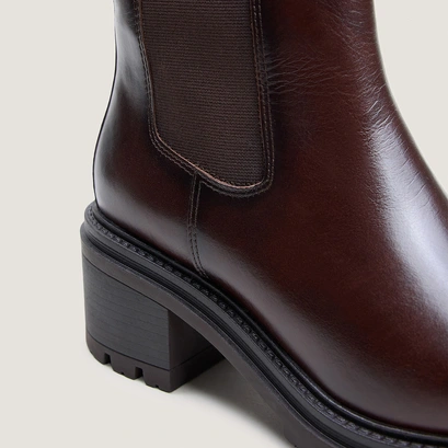 Ankle boots with lug soles in reddish-brow leather | astros
