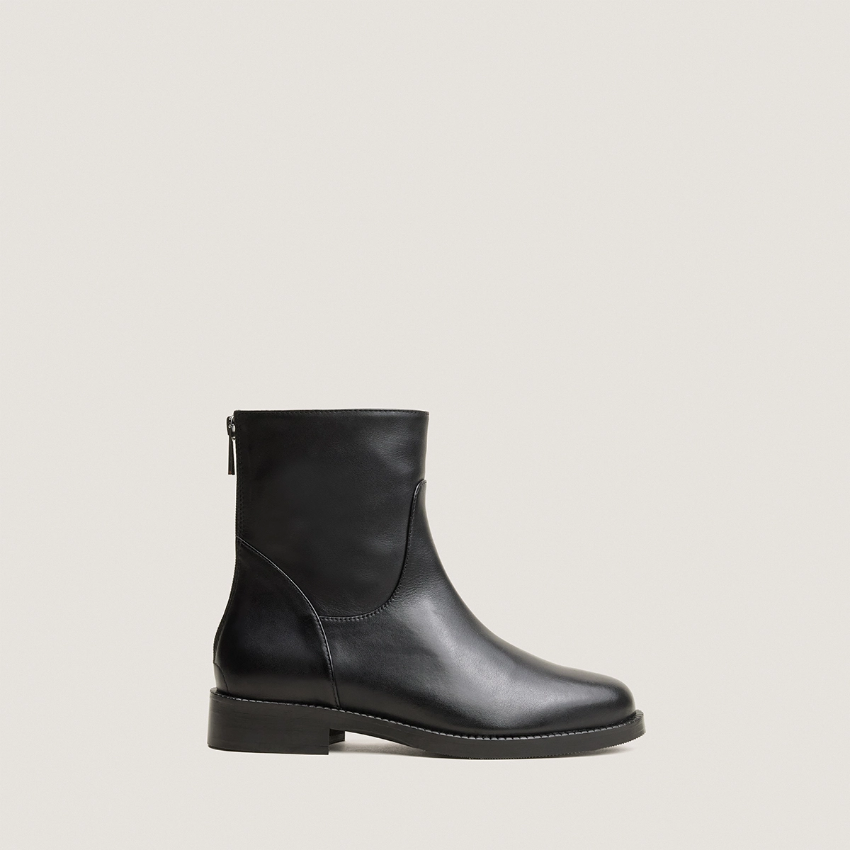 Zip heeled ankle boots in black leather | VELDA