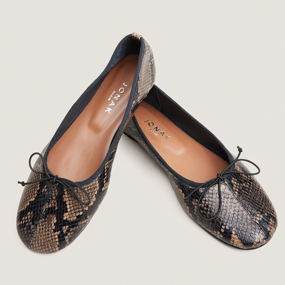 Ballet flats with small laces in taupe python-effect leather | DALLETTE