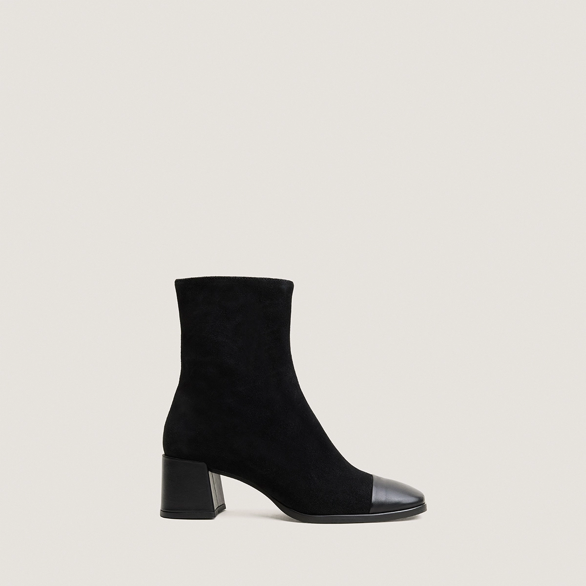 Heeled ankle boots in black leather and black suede leather | ALMIR