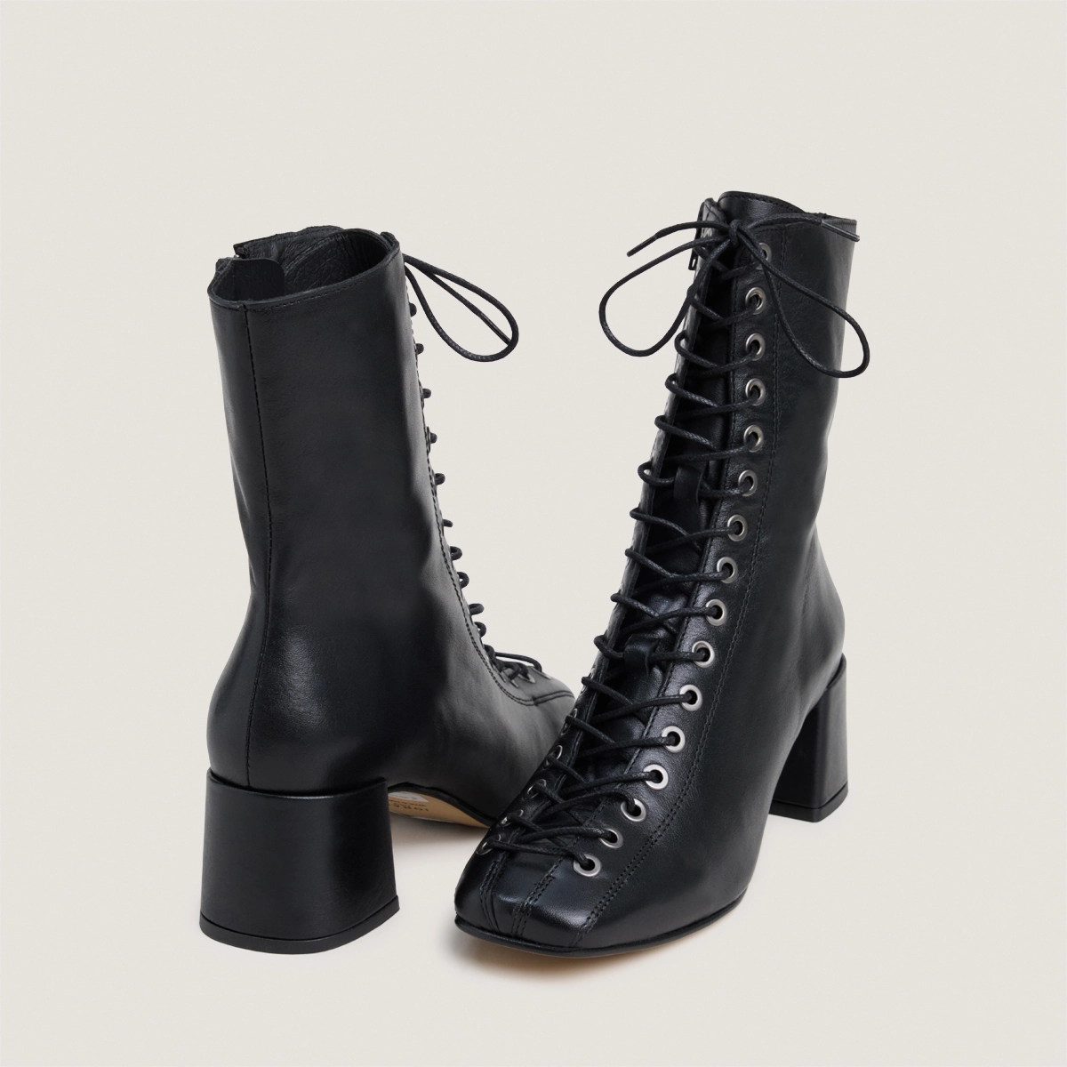 Heeled ankle boots in black leather | VAMELINE