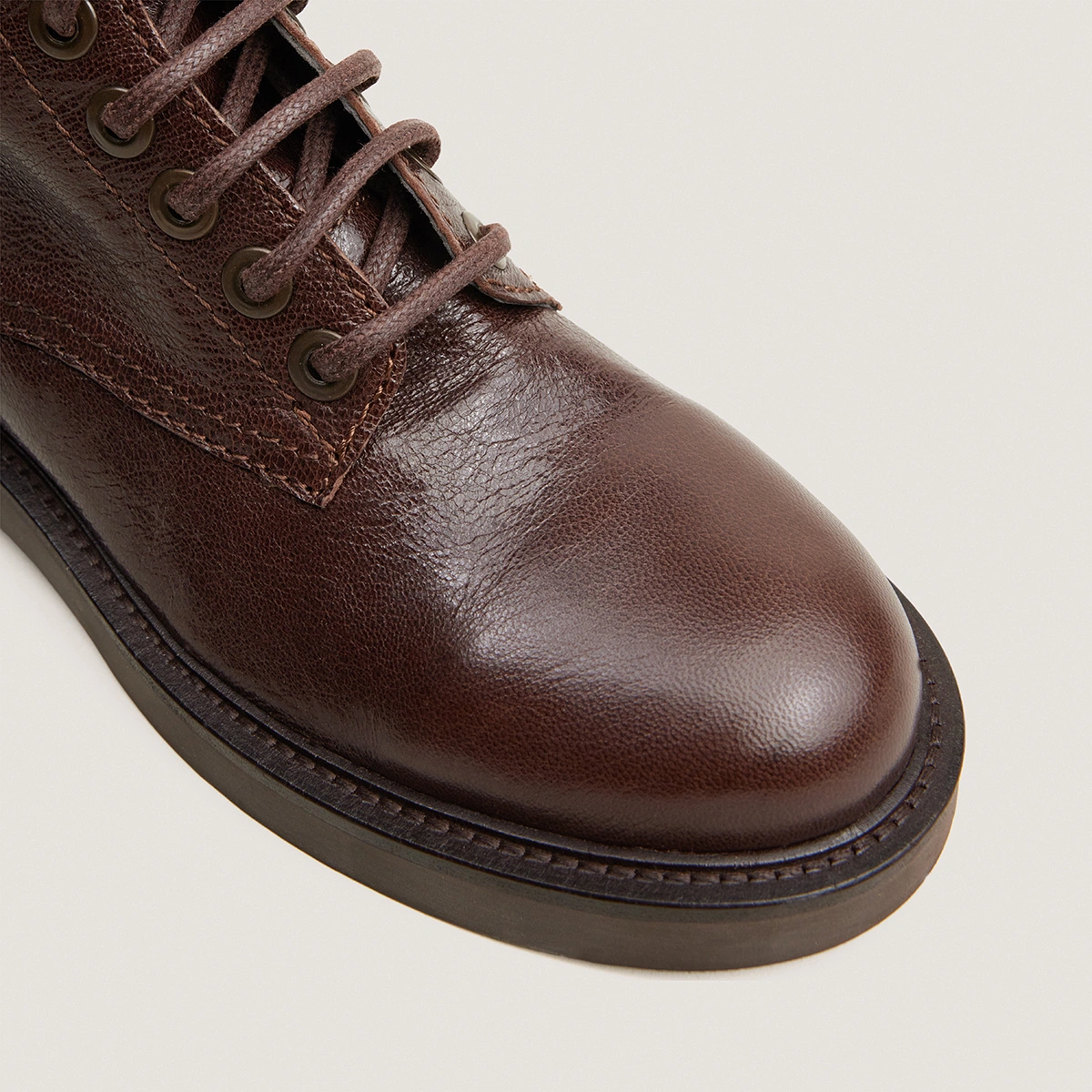Heeled boots in brown grained leather | APHELIE