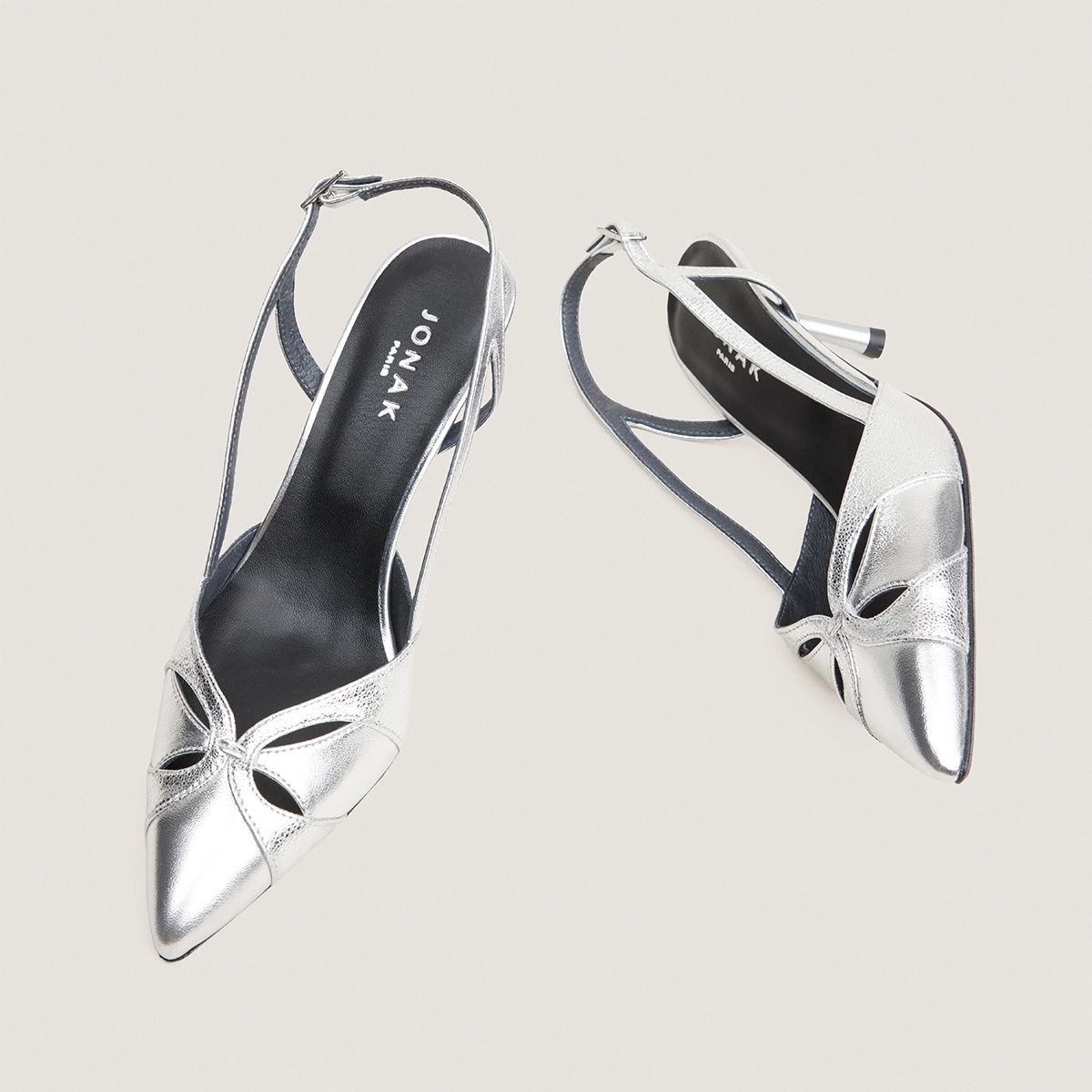Pointed-toe slingback pumps in silver metallic leather and silver crackled leather | DAMOUR