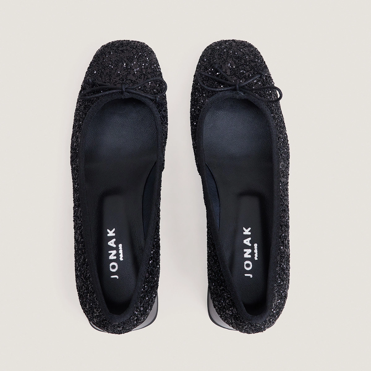 Round-Toe Ballet Flats in black glitter and black patent | DYBIL