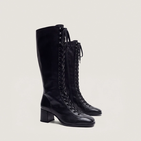 Heeled boots in black leather | VISION