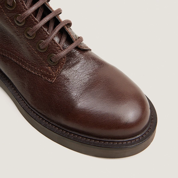 Heeled boots in brown grained leather | APHELIE
