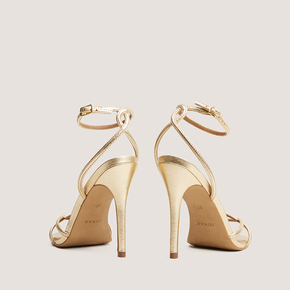 Heeled sandals in gold metallic leather | FABULEUSE