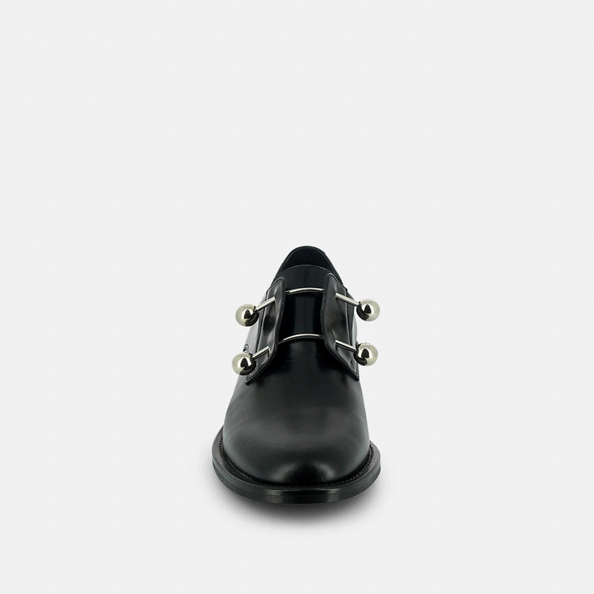 Brogues with silver bars and cabochons in black leather | DUTHEN
