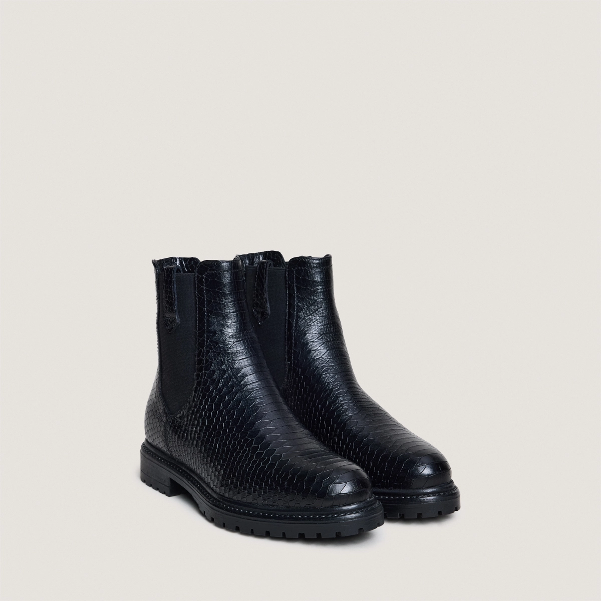 Low boots with notched soles and elastic in black reptile | CANDIDE