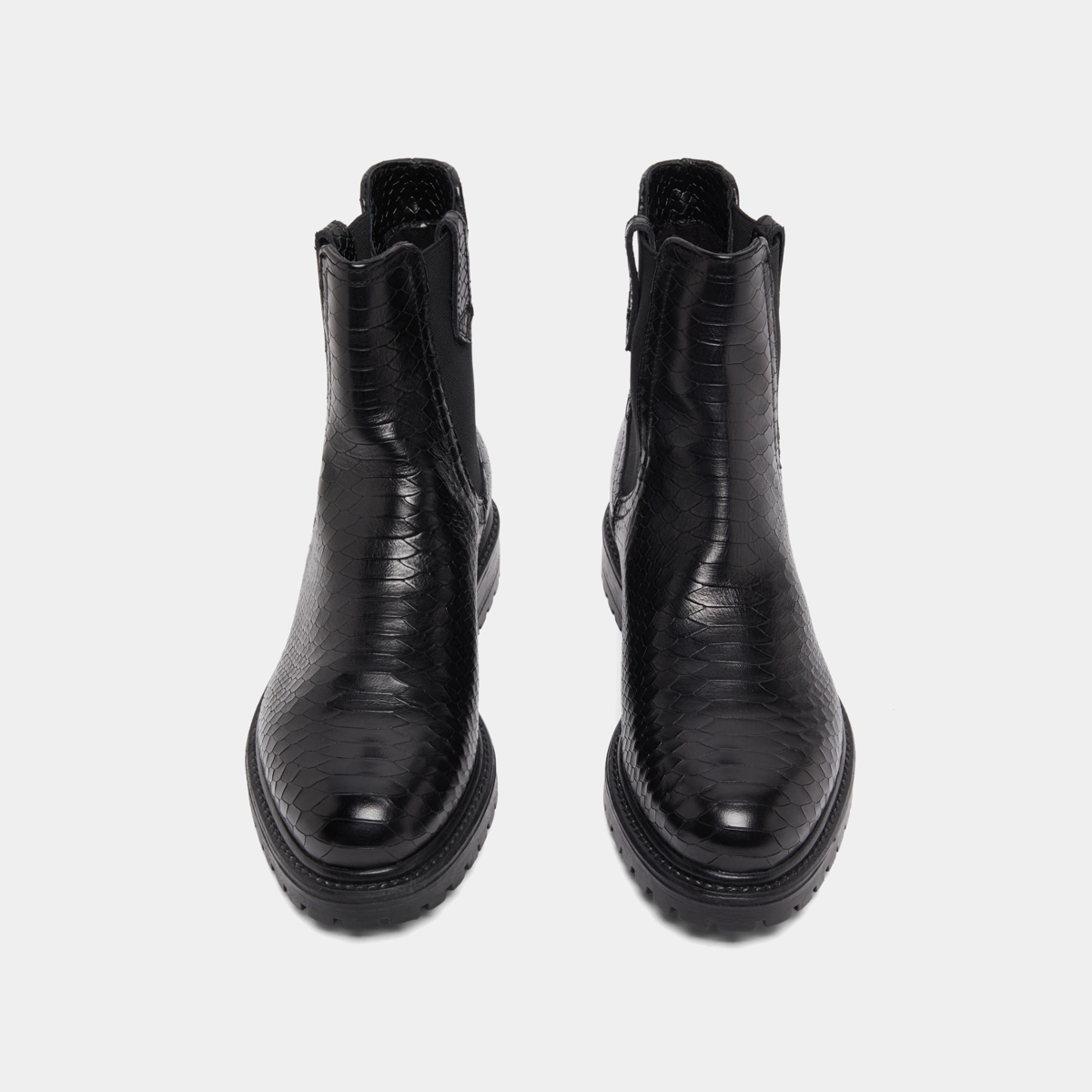 Low boots with notched soles and elastic in black reptile | CANDIDE