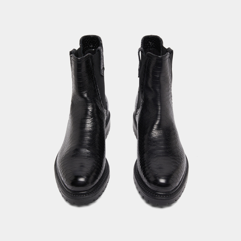 Low boots with notched soles and elastic black