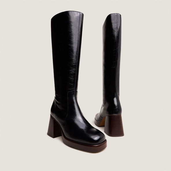 Platform boots in distressed black leather | BETINA