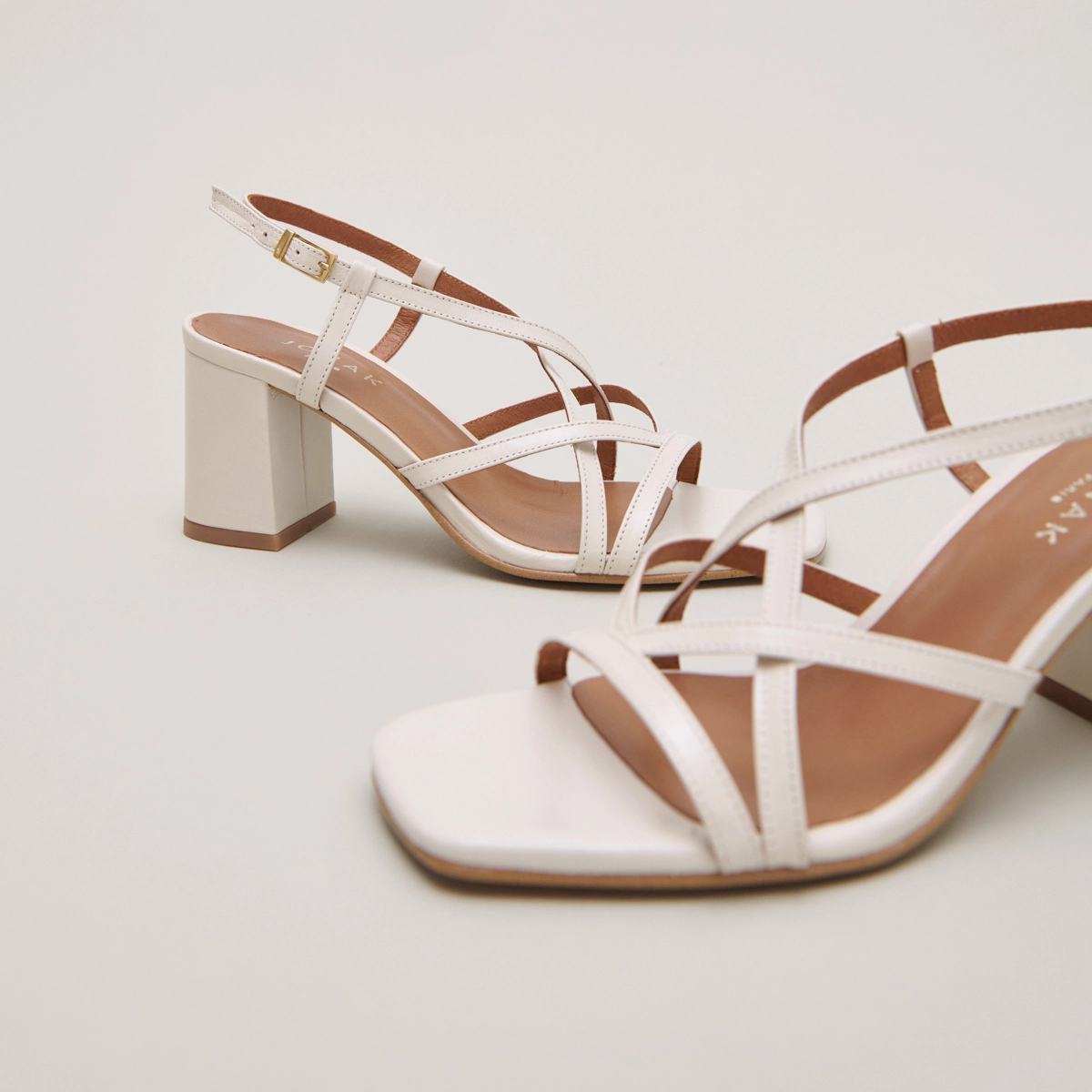 Square toe flanged heeled sandals in ecru leather | VERLAINE