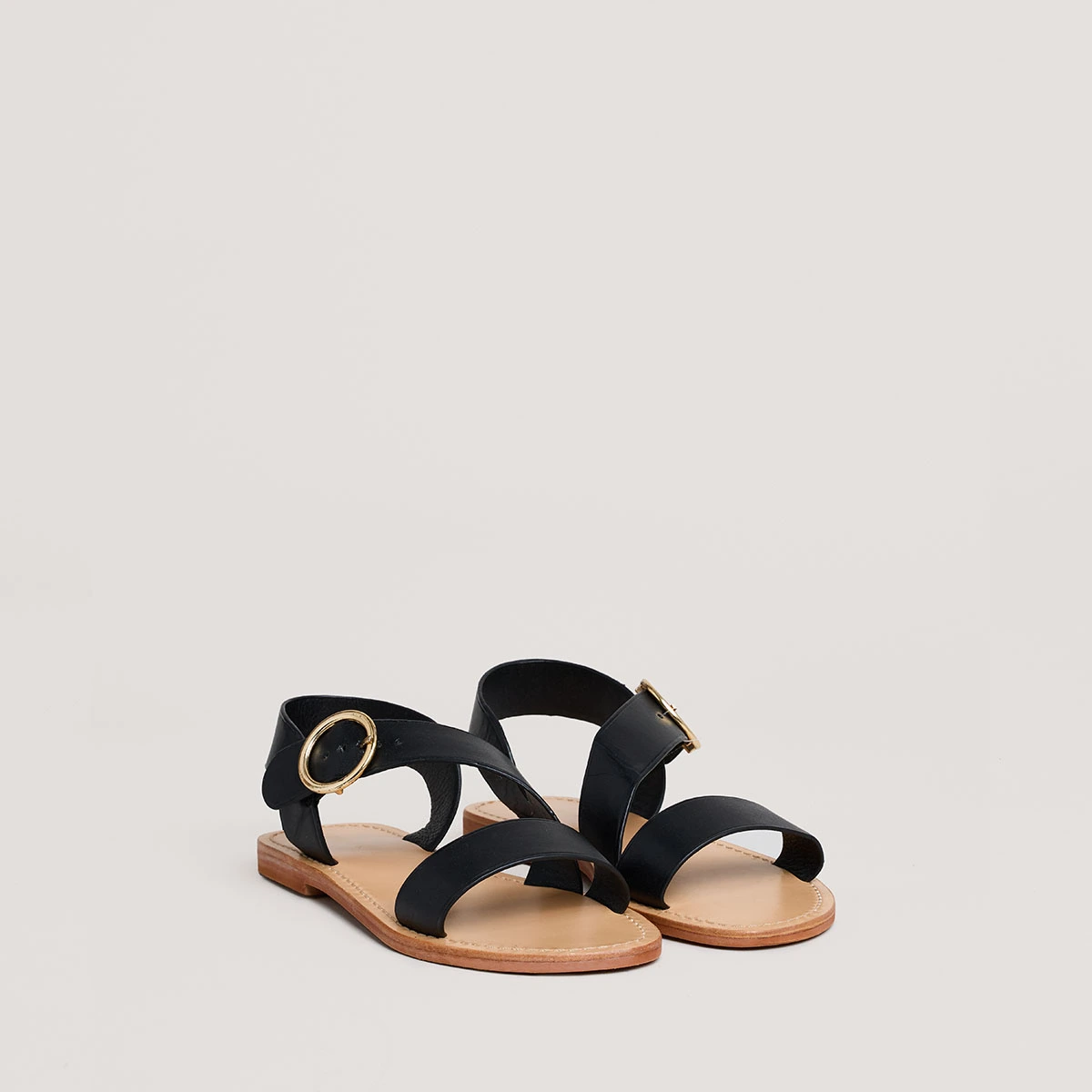 Asymmetrical sandals in black leather | WABLO