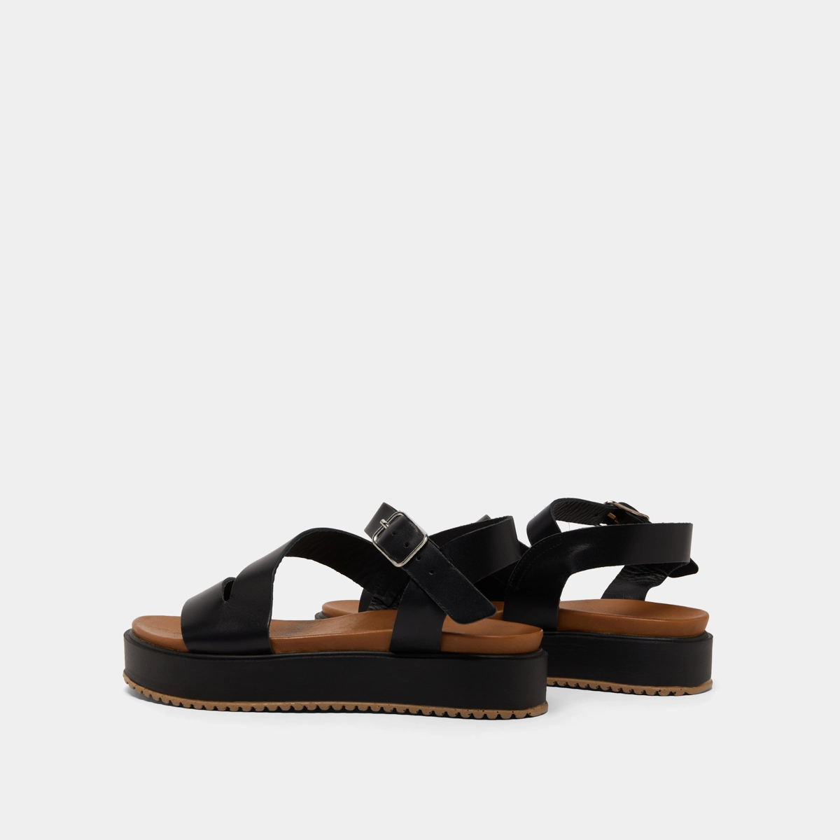 Platform sandals with straps in black leather | ISAURE