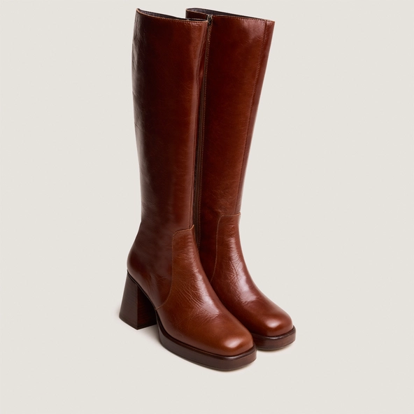 Platform boots in distressed brown leather | BETINA