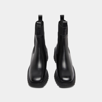 Boots with elastics and notched sole in glazed black leather | dove