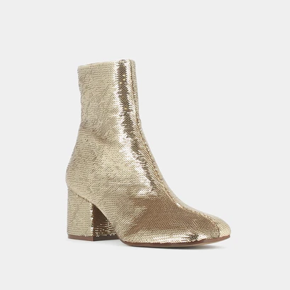 Heeled boots in platinum sequins | darlene