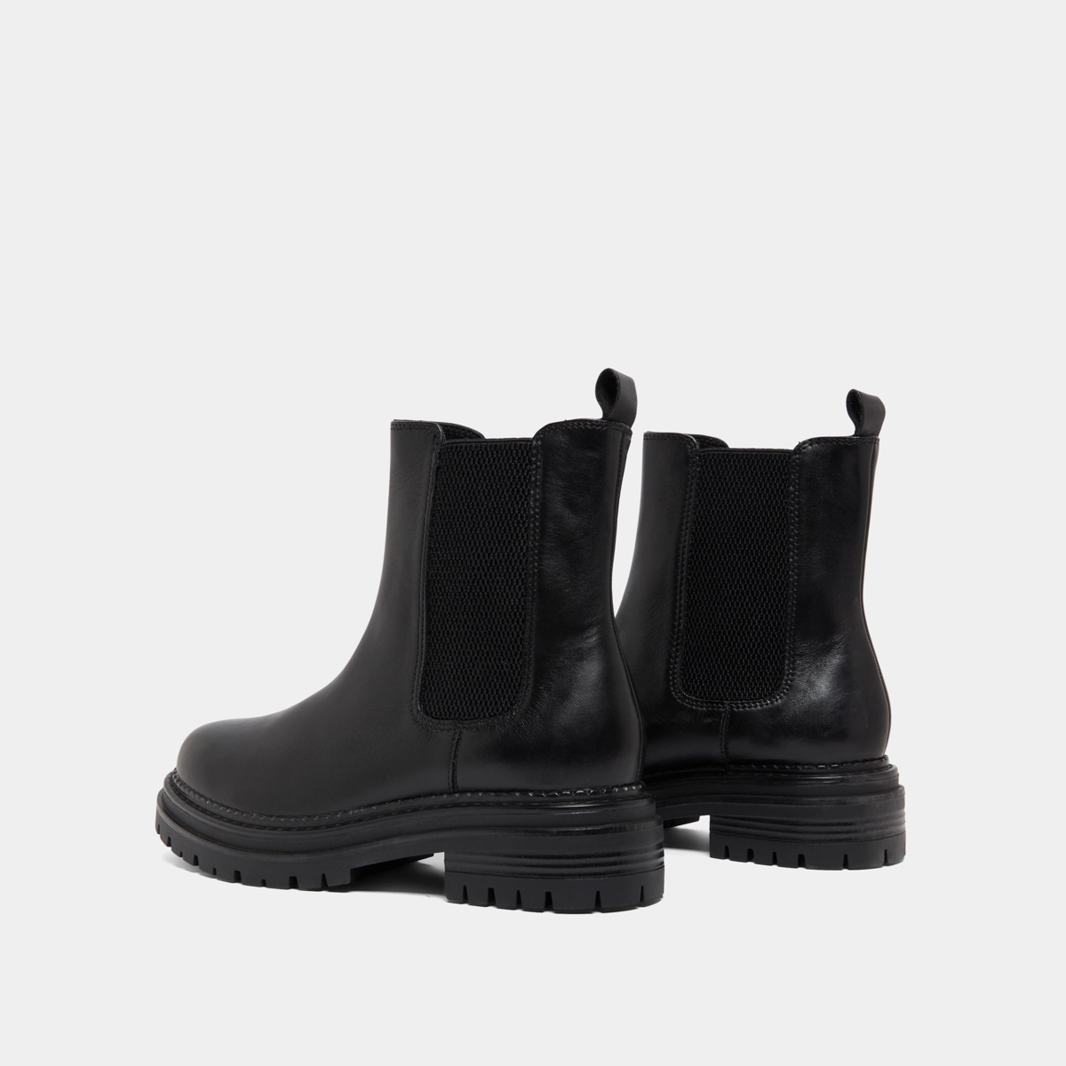 Low boots with notched soles and elastic in black leather | ADALARD