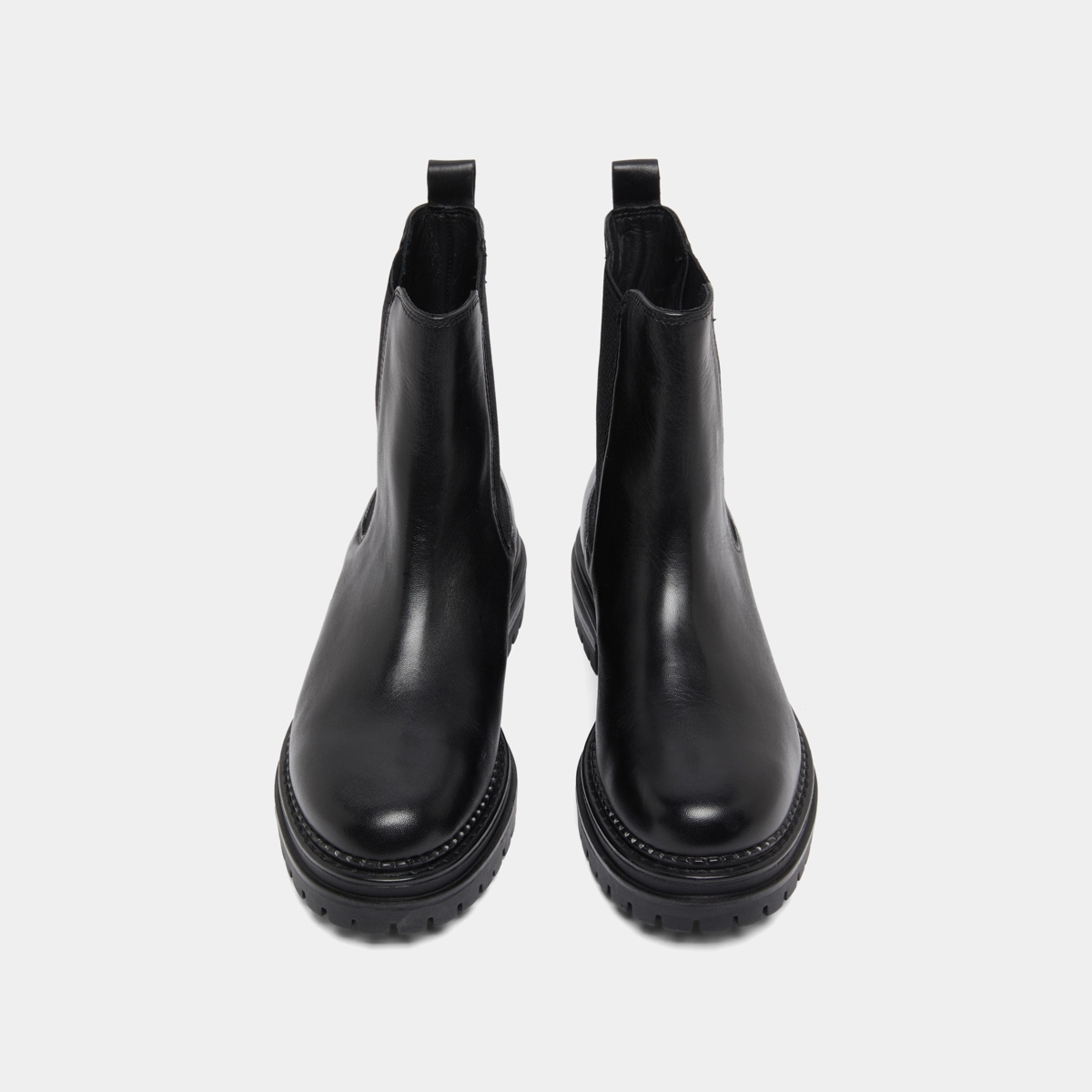 Low boots with notched soles and elastic in black leather | ADALARD