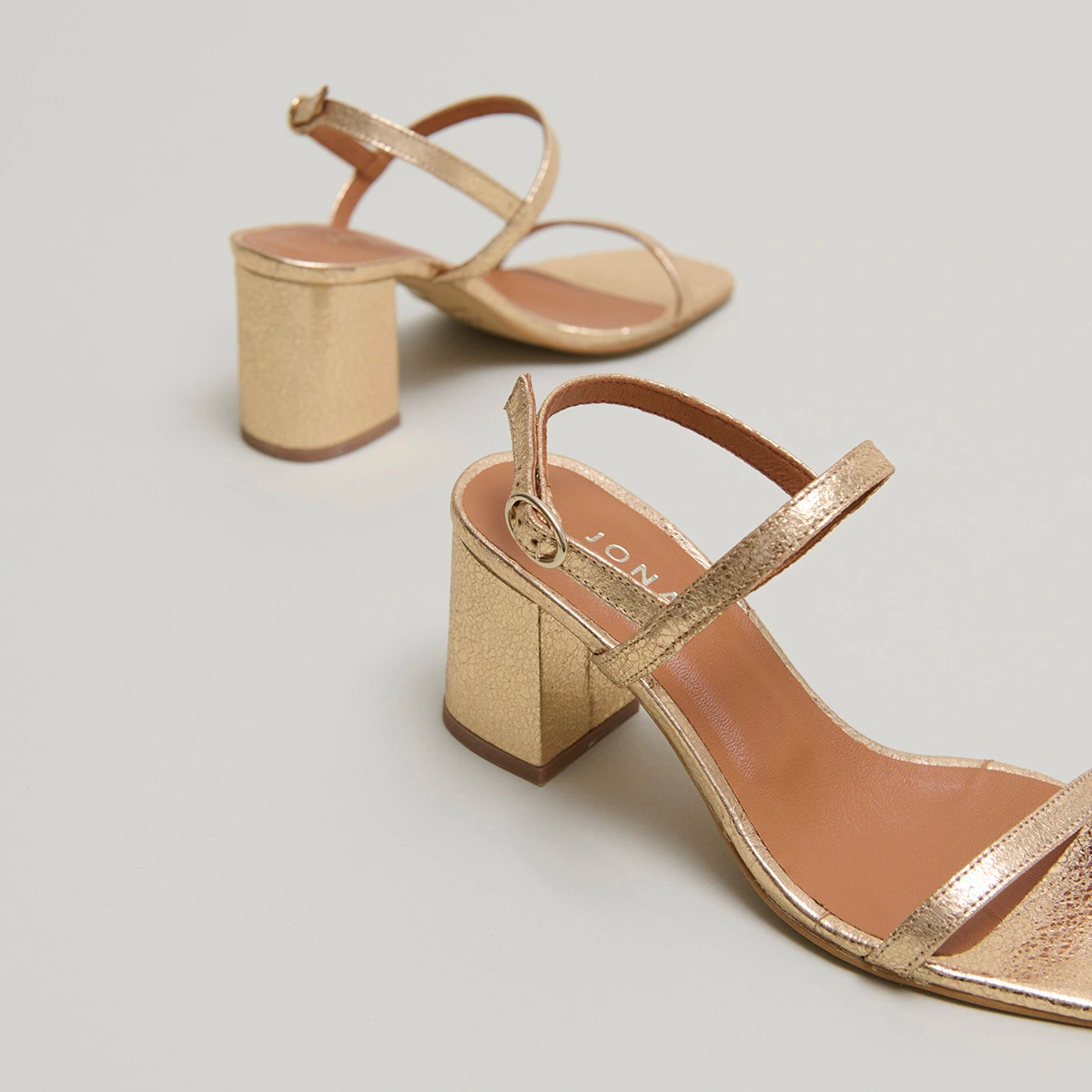 Open-toe sandals with heels in gold cracked leather | VIGNE