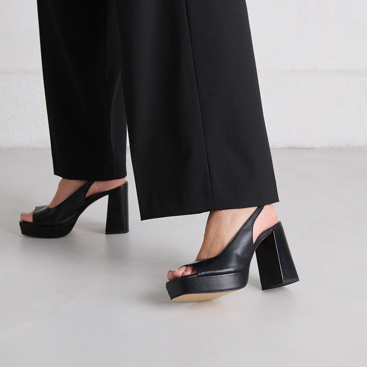 Square toe pumps with high heels in black leather | VLAD