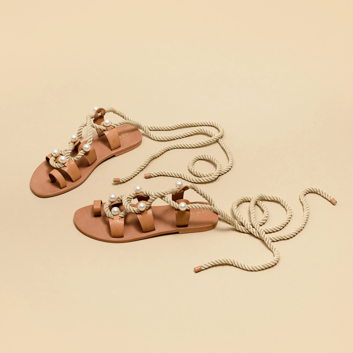 Sandals with straps, beads and braided straps in camel leather | WAFFLE