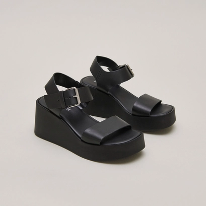 Platform sandals in black leather | ELSA