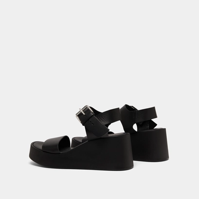 Platform sandals in black leather | ELSA