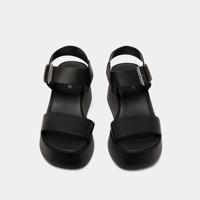 Platform sandals in black leather | ELSA