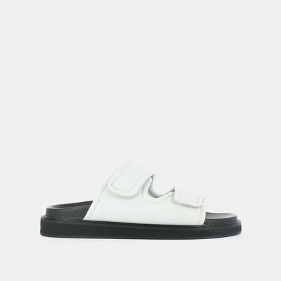 Mules with double fasteners in white leather | warning