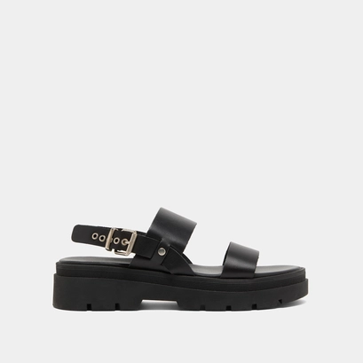 Sandals with thick straps and notched soles in black leather | PEINTURE