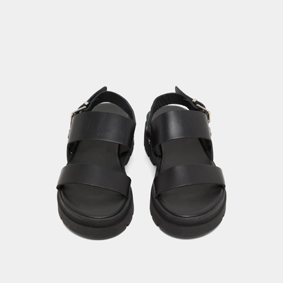 Sandals with thick straps and notched soles in black leather | PEINTURE