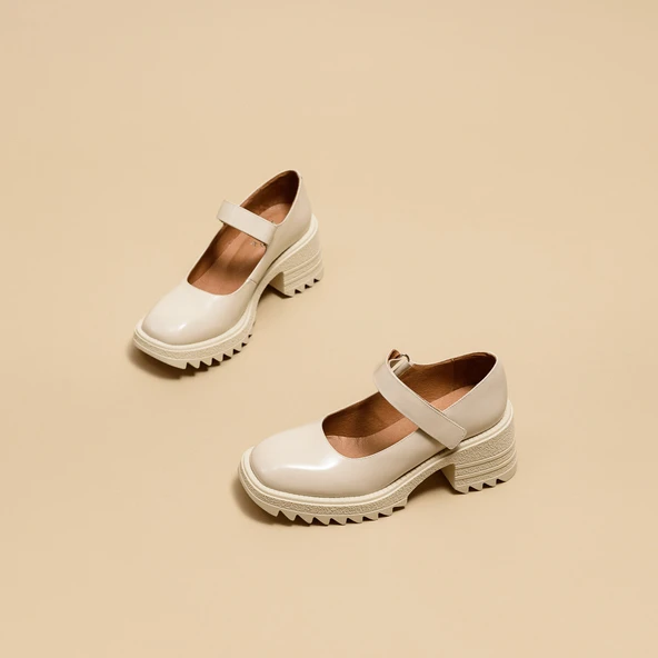 Babies with notched soles in glazed ecru leather | DOVY