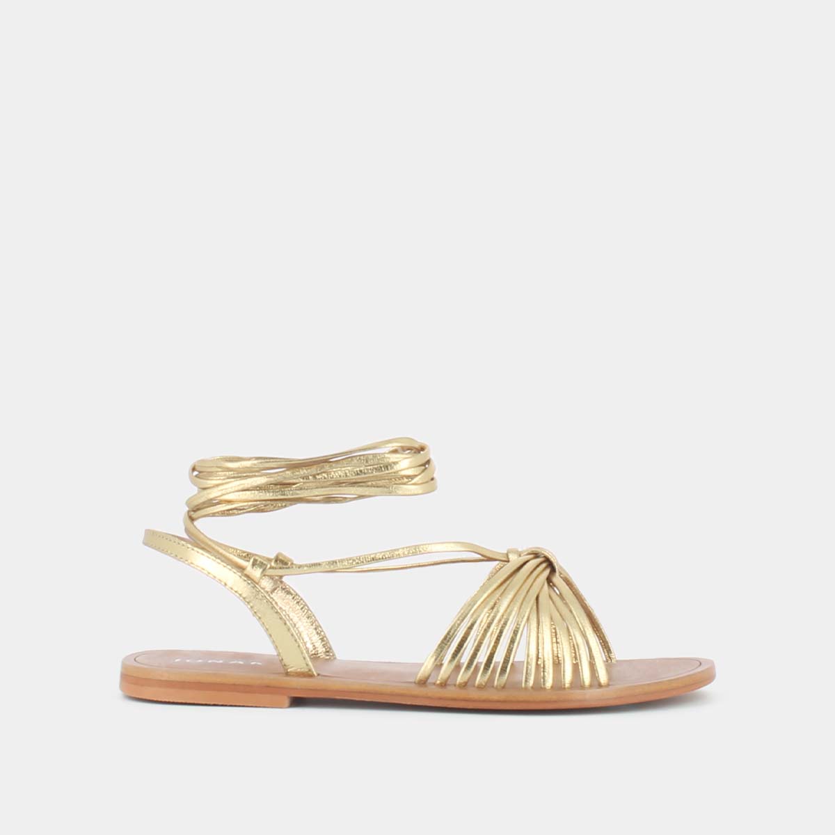 Sandals with ties in gold metallic leather | WALLEN