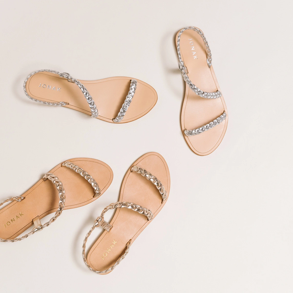 Braided strappy sandals in gold metallic leather | WINDY