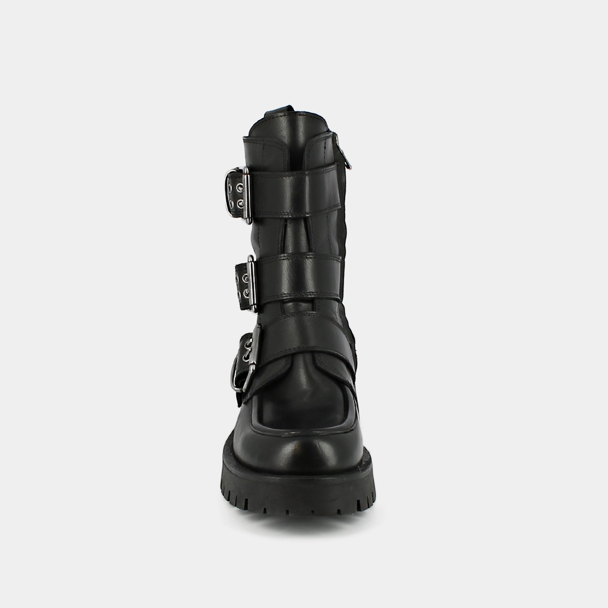Boots with notched soles and straps in black leather | RUNNER