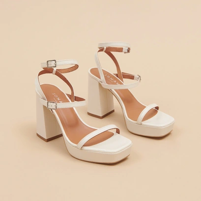 Strap and platform sandals in unbleached distressed leather | vlado