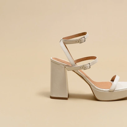 Strap and platform sandals in unbleached distressed leather | vlado