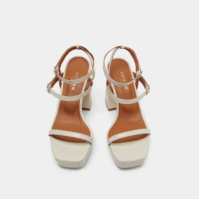 Strap and platform sandals in unbleached distressed leather | vlado