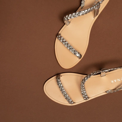 Braided strappy sandals in gold metallic leather | windy
