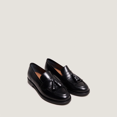 Flat heel loafers with tassels in black leather | die