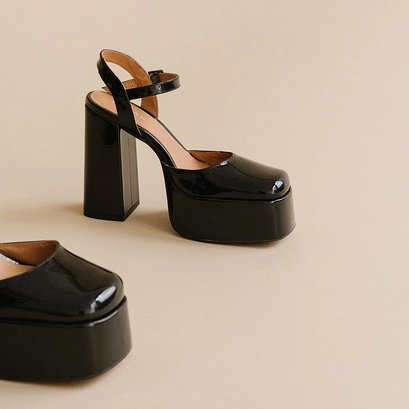 Platform slippers with straps in black patent | bachelier