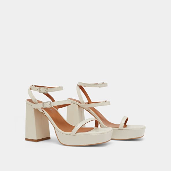 Strap and platform sandals in unbleached distressed leather | Jonak