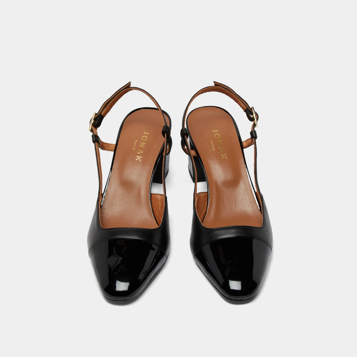 Mary Janes with heels in black patent and leather | DHAPOP