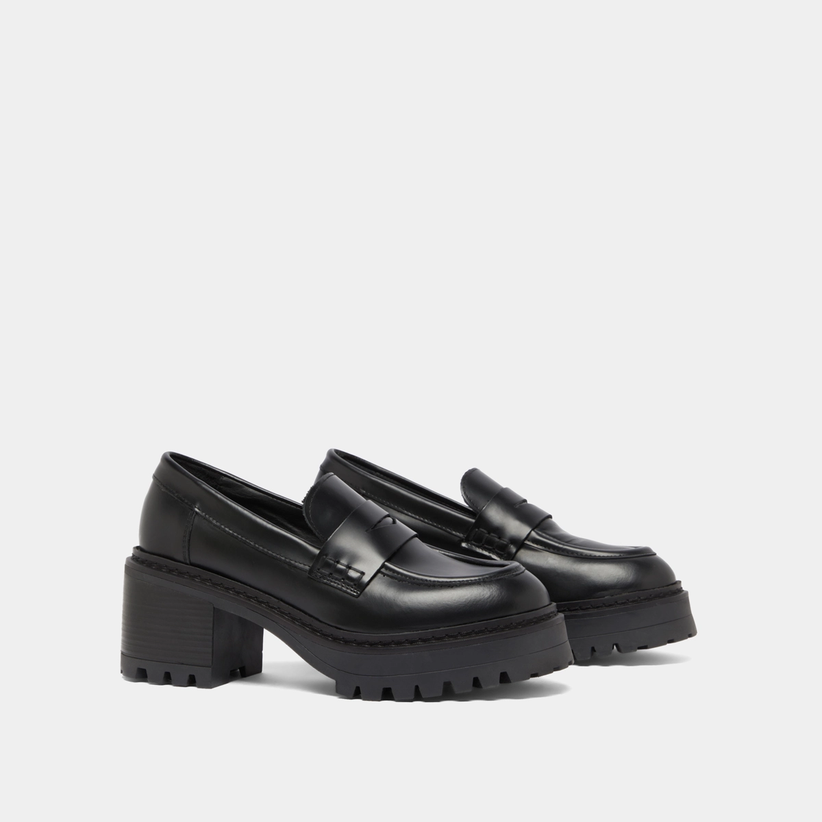 Heeled loafers with notched soles in black shiny leather | RHUM